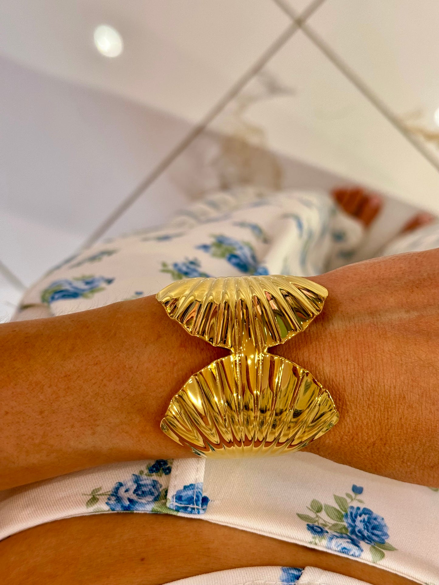 Manchette coquillage or