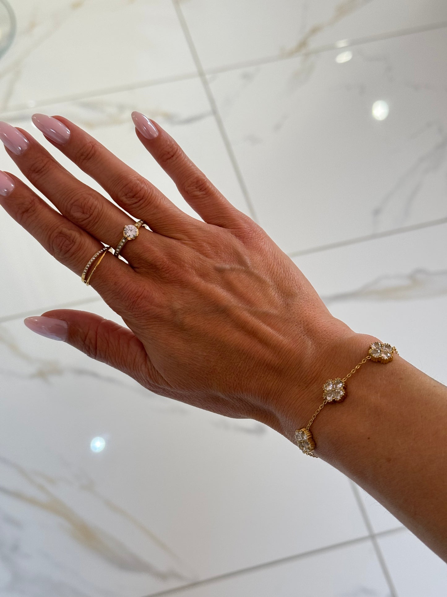 Bracelet cinq trèfles et strass or