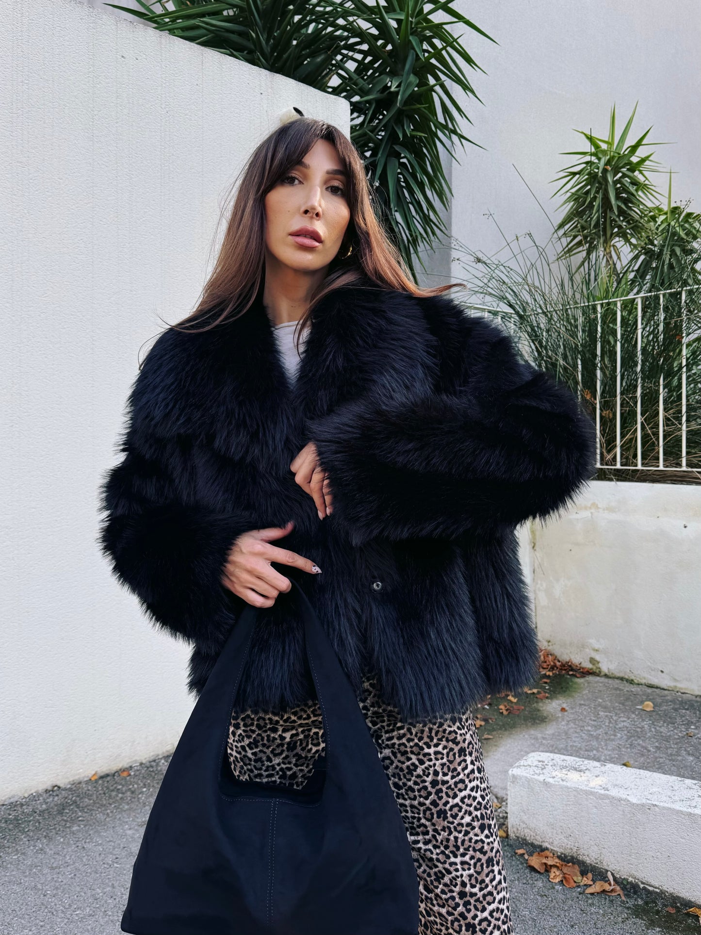 Manteau fausse fourrure noire