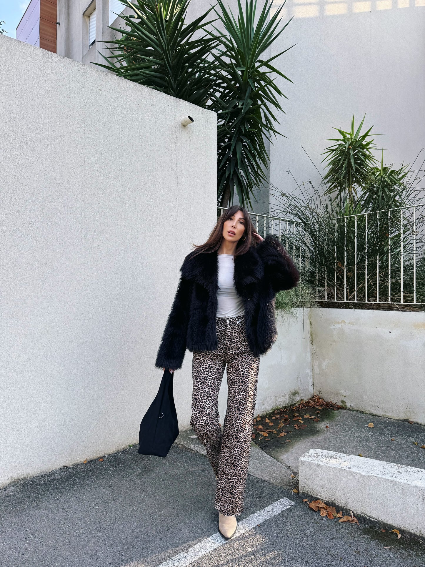 Manteau fausse fourrure noire