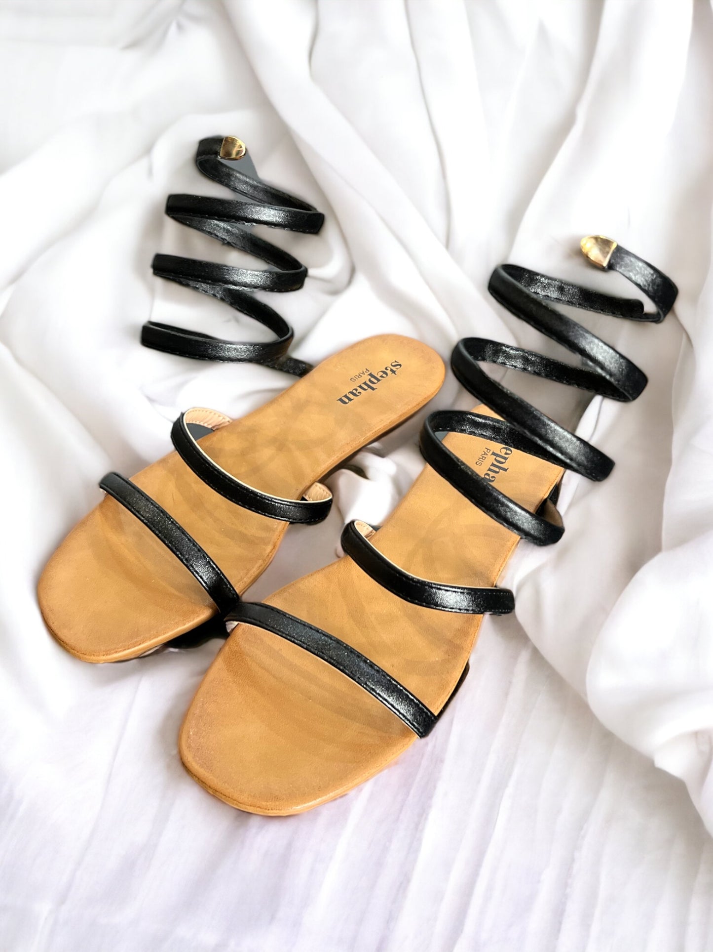 Sandales plates serpentins noires