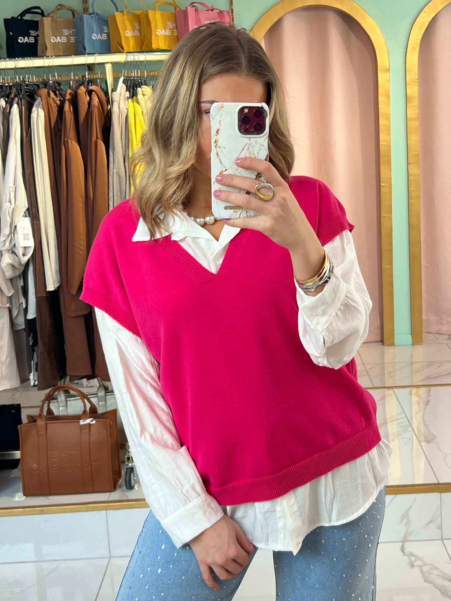 Top en maille à col en V sans manches - rose fushia