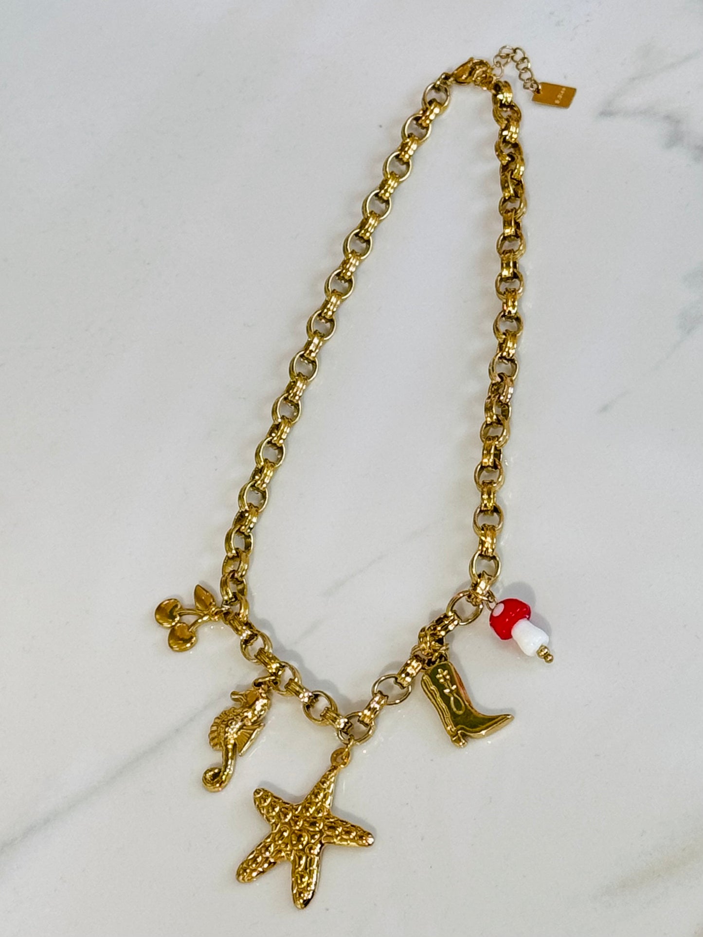 Collier breloque étoile de mer , santiags & compagnie