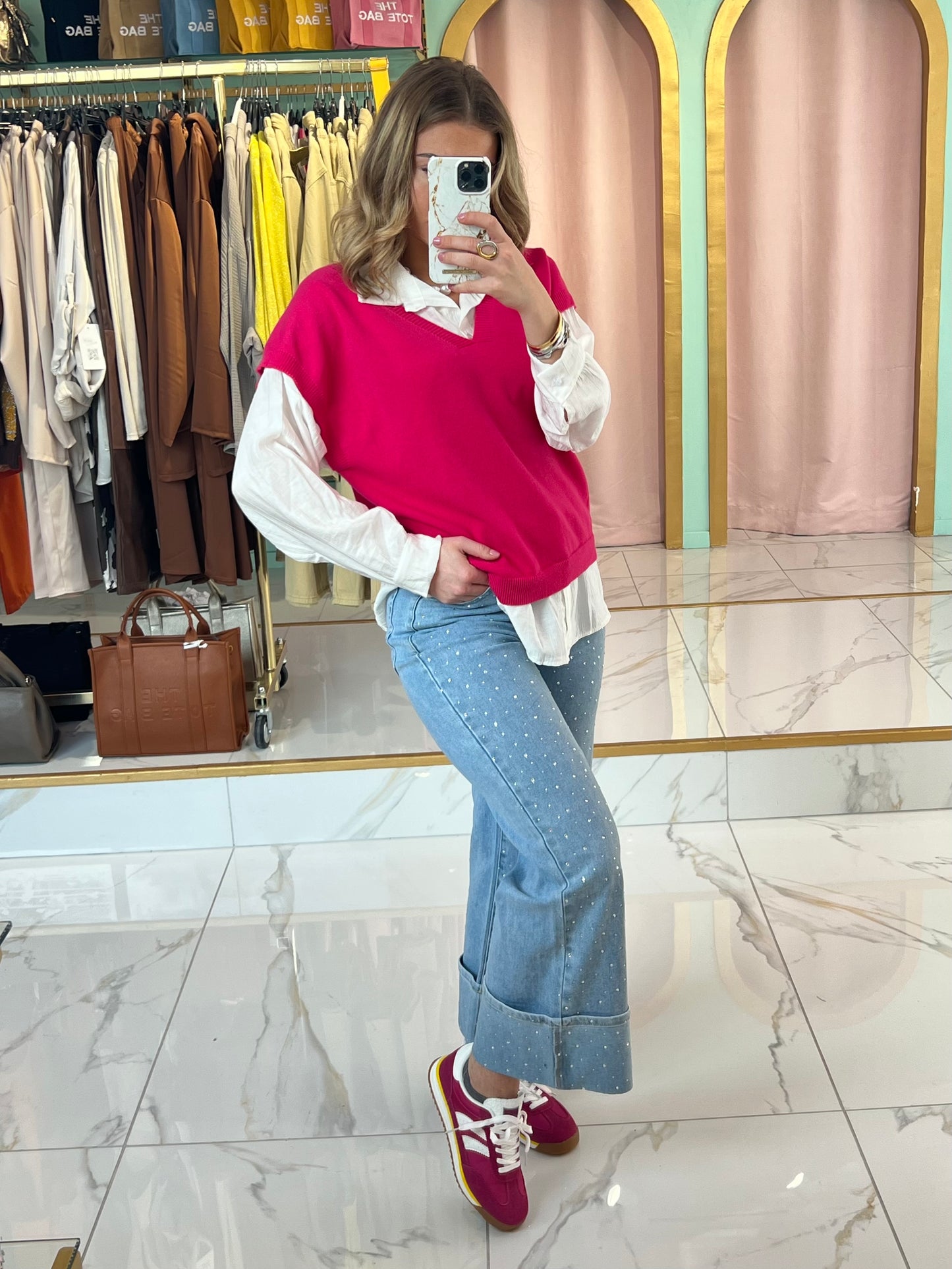 Top en maille à col en V sans manches - rose fushia