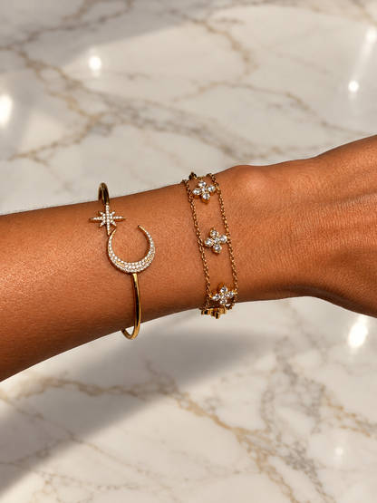 Bracelet double chaîne avec trèfles à 4 feuilles