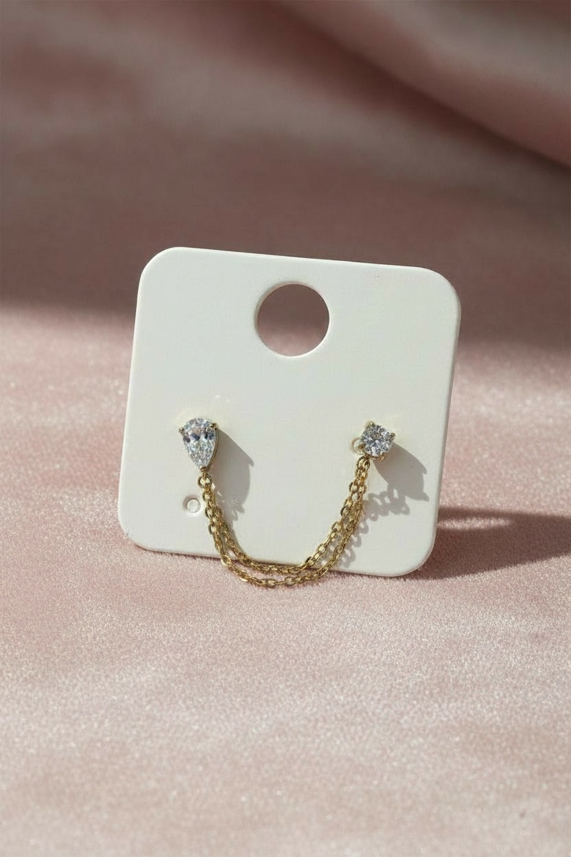 Monoboucle double strass avec chaînette coloris or