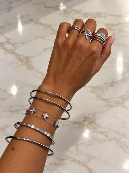 Bracelet double chaîne avec trèfles à 4 feuilles