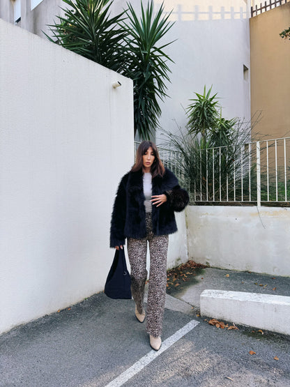 Manteau fausse fourrure noire