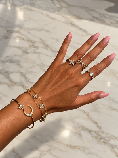 Bracelet double chaîne avec trèfles à 4 feuilles