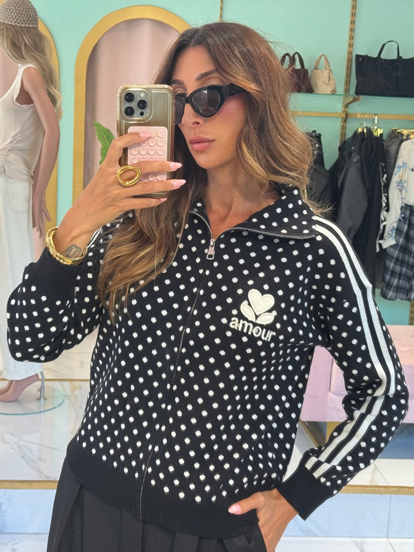 Veste zipée noire  à pois blanc en maille