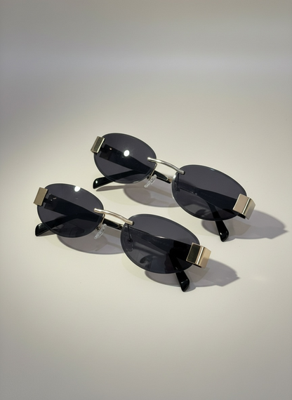 Lunettes de soleil noire CC