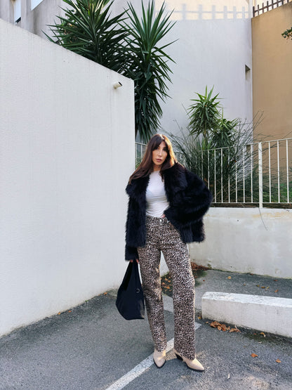 Manteau fausse fourrure noire