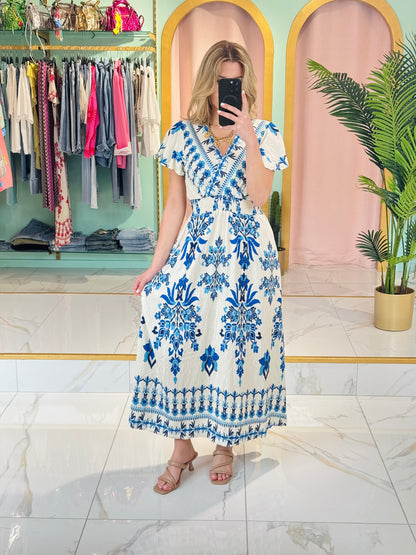 Robe longue cache-cœur à motifs estivaux – coloris bleu
