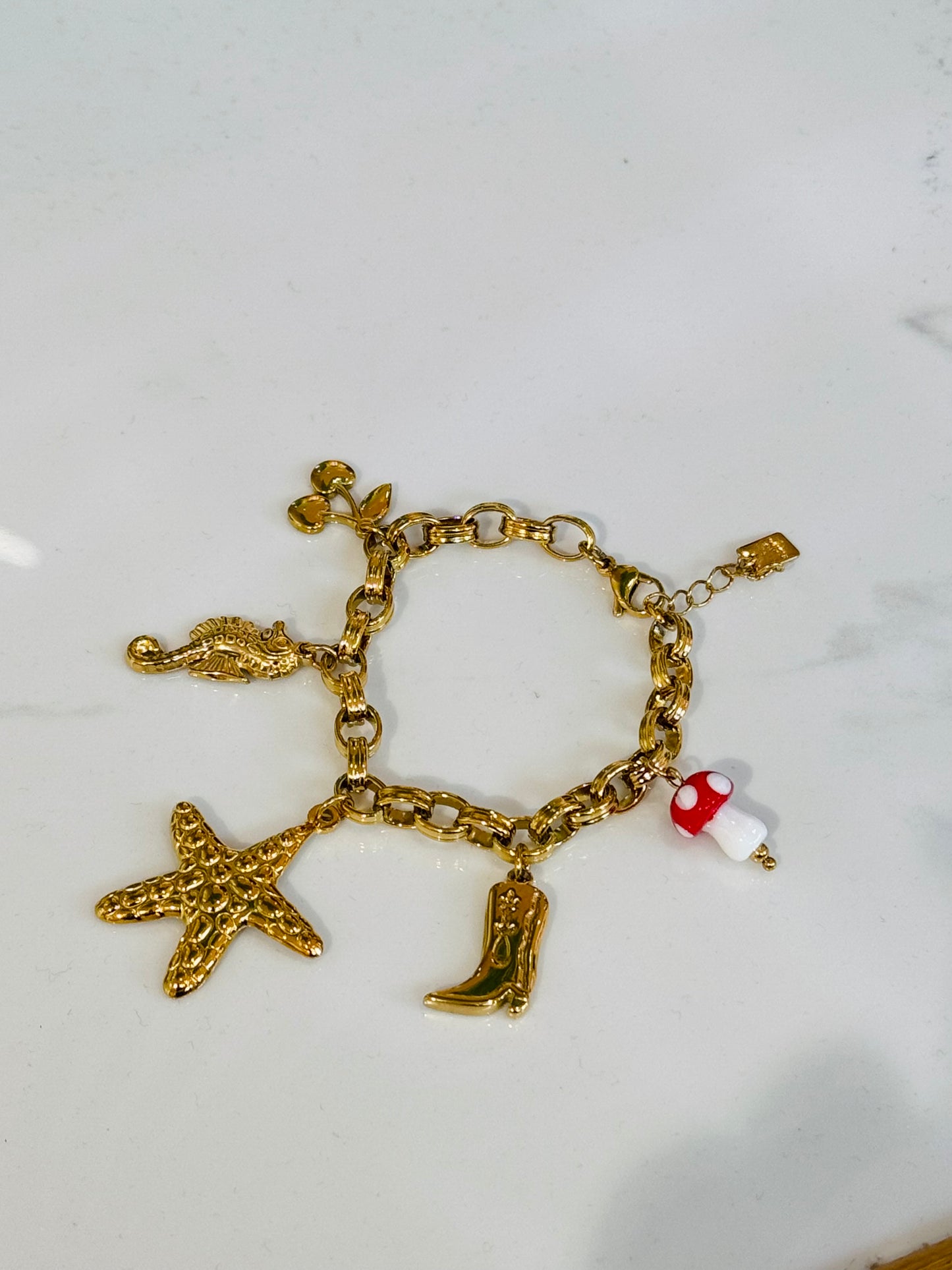 Bracelet breloques étoile de mer , santiag & compagnie