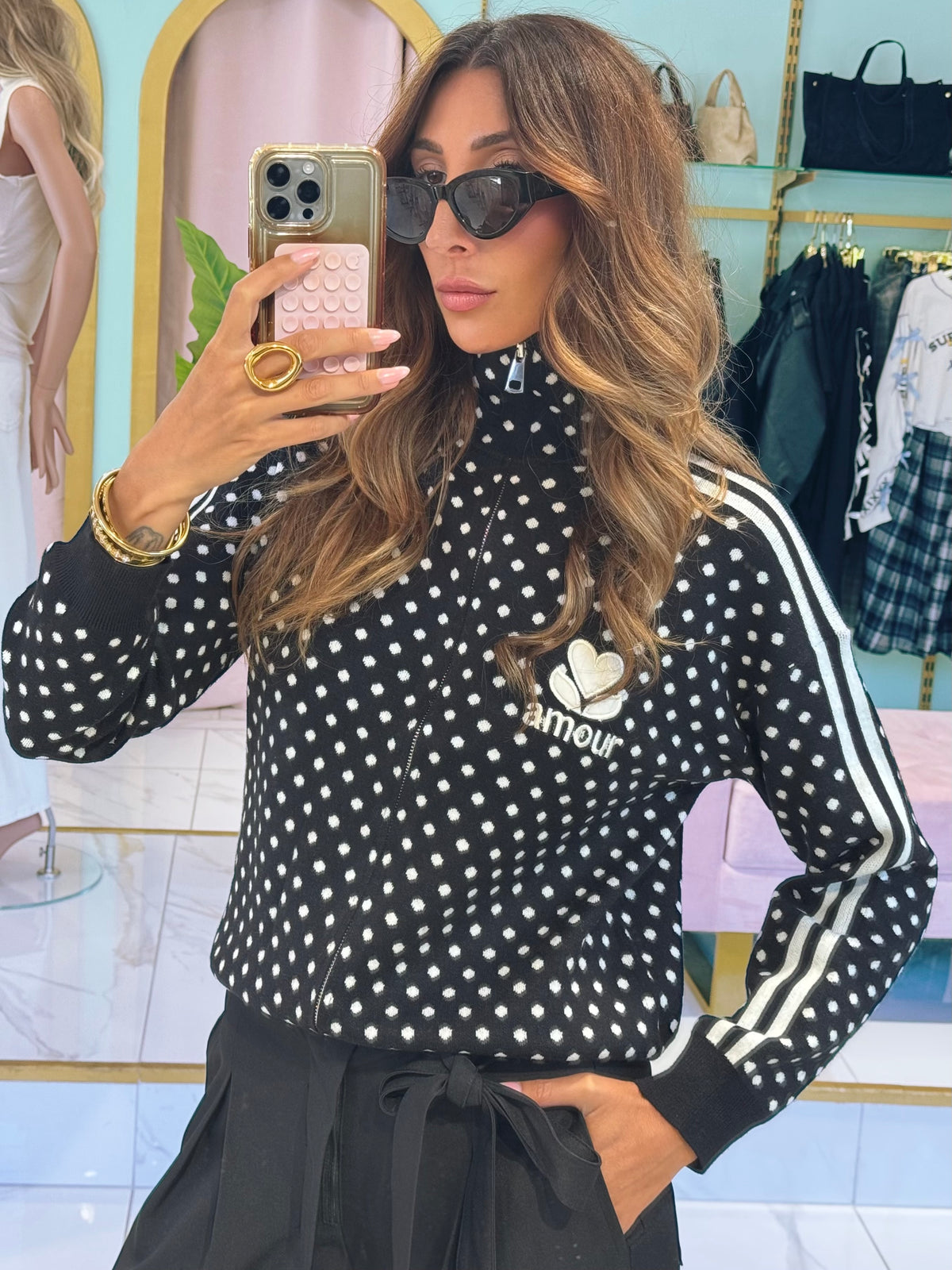 Veste zipée noire  à pois blanc en maille