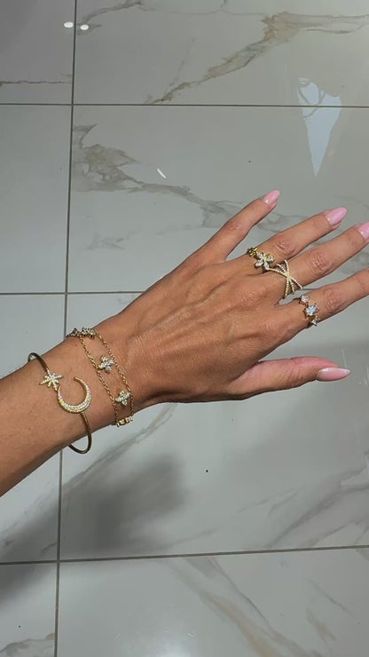 Bracelet double chaîne avec trèfles à 4 feuilles